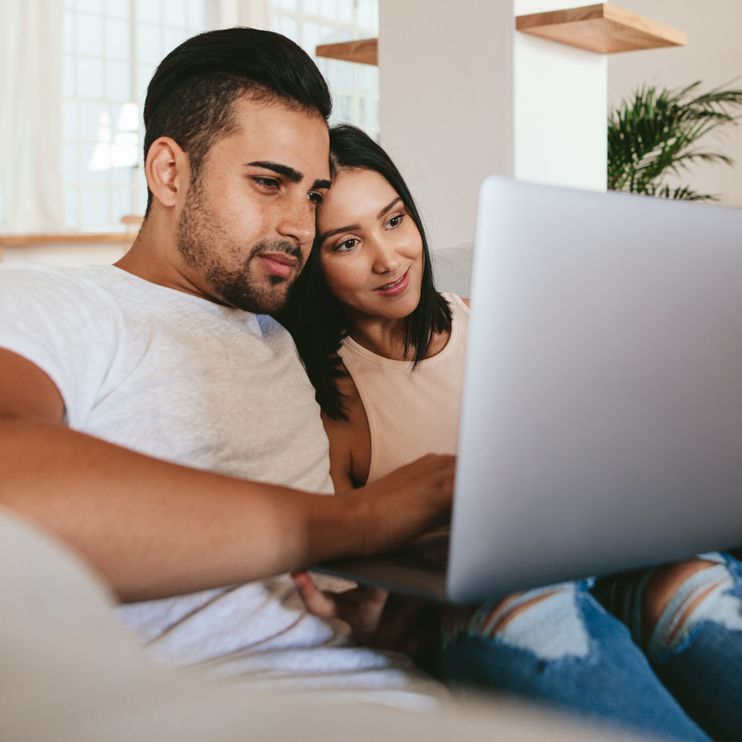 couple looking at a computer together