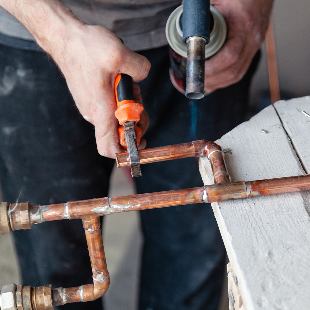 man working on a gas line repair