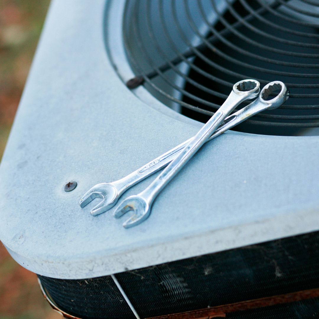 Wrench on air conditioning unit